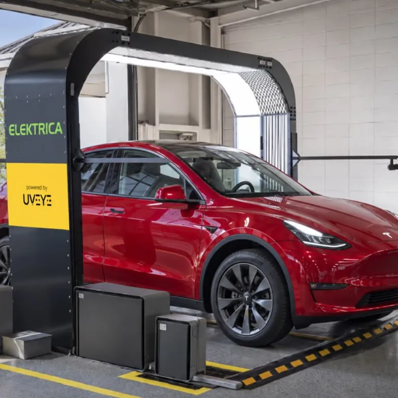 Elektrica drive-through vehicle scanner powered by UVeye, with a Tesla Model Y in the scan lane